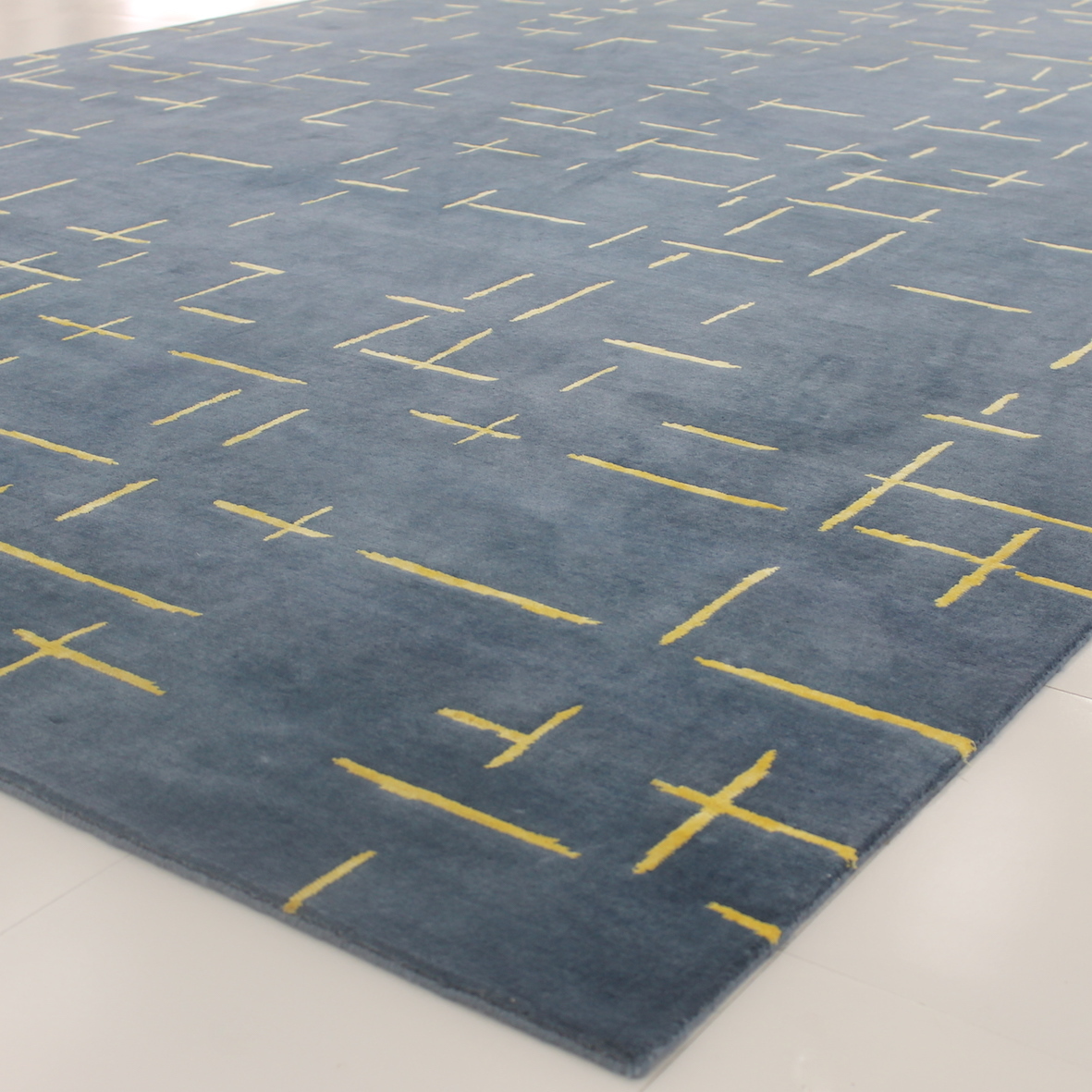 Modern geometric blue yellow rug
